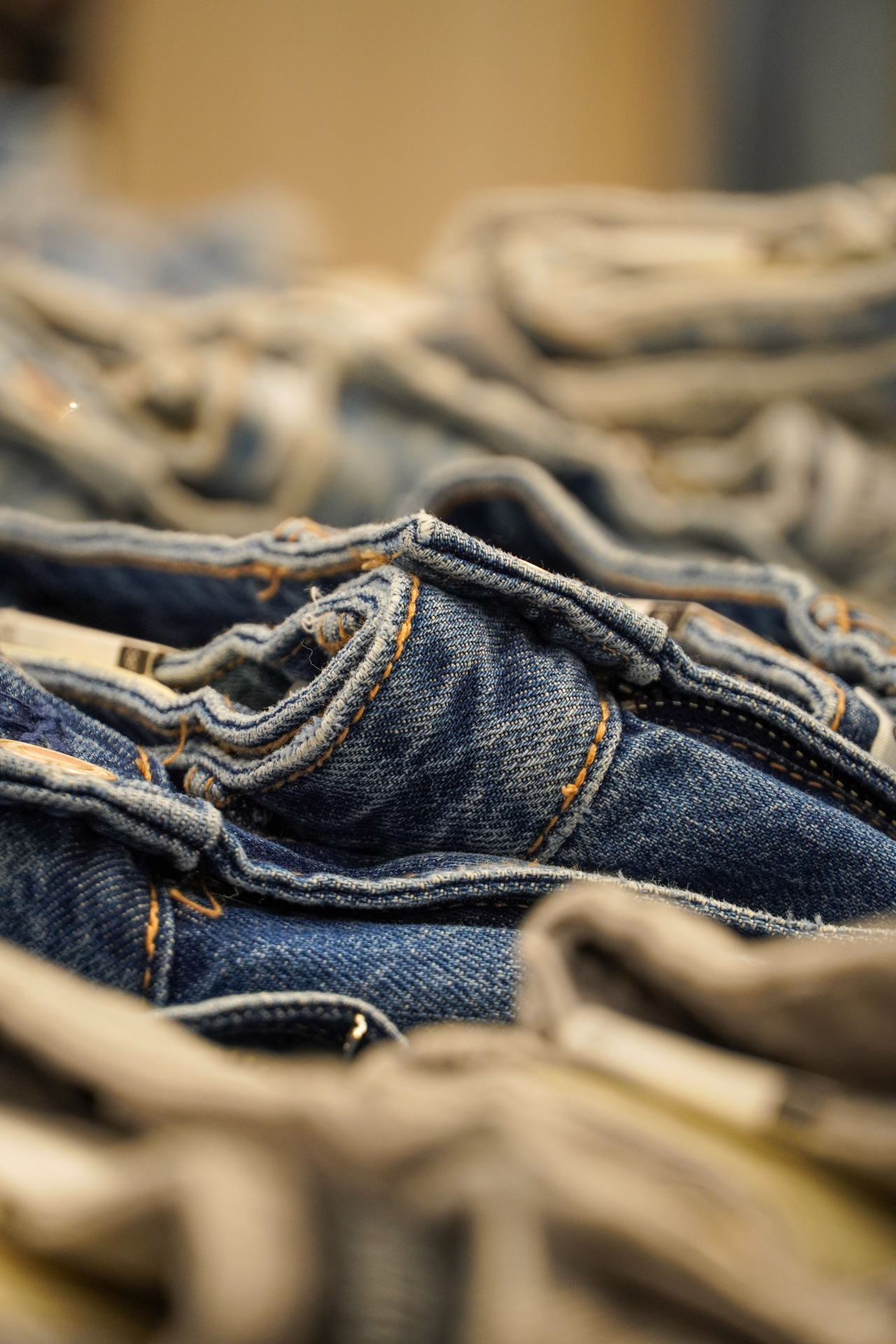 Close-up of stonewashed light blue denim stack