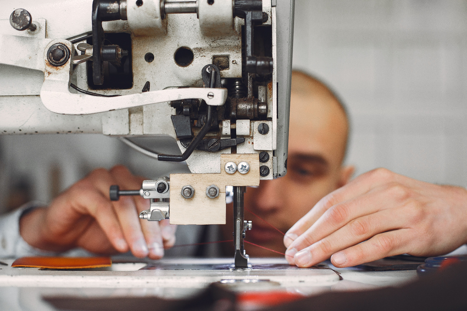 Garment operator working at a sewing machine